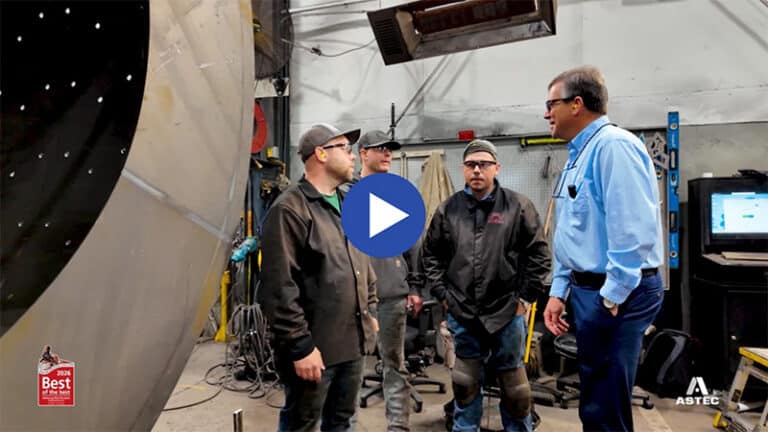 Manufacturing Day video thumbnail, Jaco standing with three shop employees