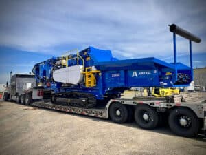 Peterson 3710E horizontal grinder on trailer